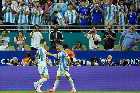 Lautaro Martínez celebrates with teammate Valentín Carboni